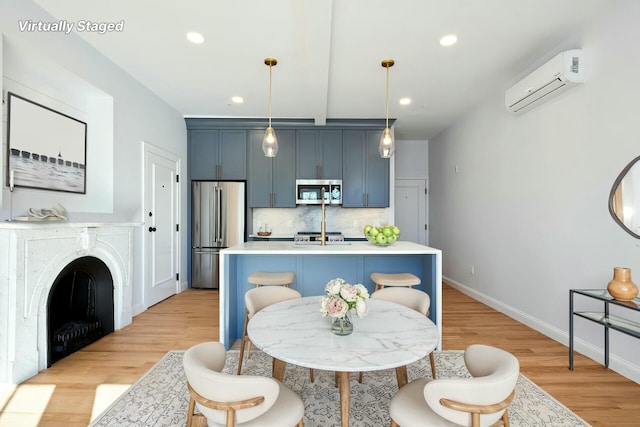 401 Main St Unit 201, West Dennis, MA 02670 - dining space featuring baseboards, recessed lighting, light wood finished floors, and a wall mounted AC