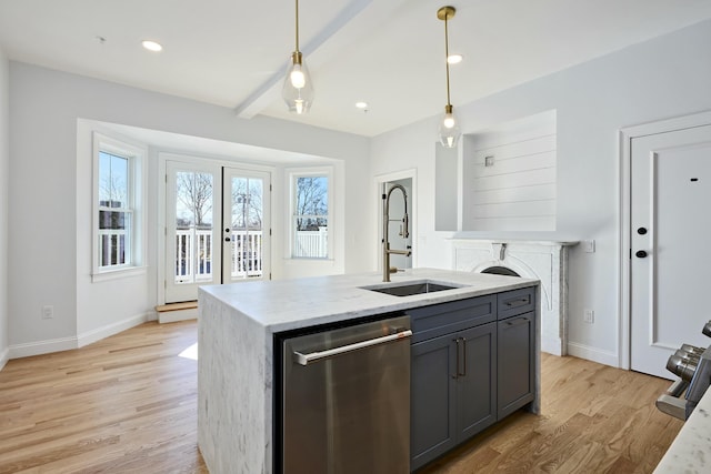 401 Main St Unit 201, West Dennis, MA 02670 - kitchen with a sink, light wood finished floors, dishwasher, and decorative light fixtures