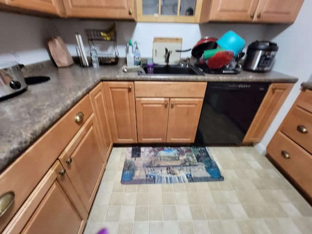 307 W Main St Unit 7, Hyannis, MA 02601 - kitchen featuring dishwasher, a sink, and glass insert cabinets