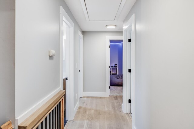 115 Kiahs Way E, Sandwich, MA 02537 - hall with light wood-style floors, baseboards, and attic access