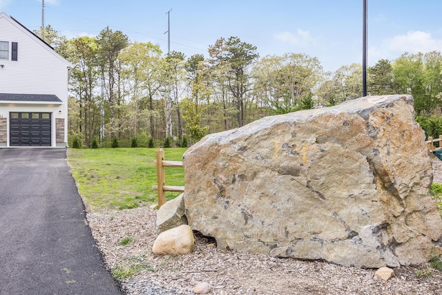 115 Kiahs Way E, Sandwich, MA 02537 - view of grassy yard with a garage and driveway
