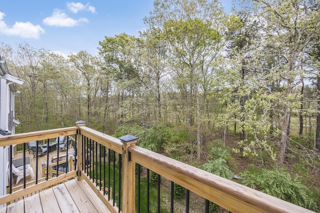 115 Kiahs Way E, Sandwich, MA 02537 - wooden deck featuring a forest view