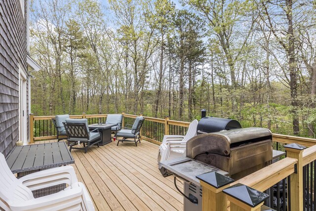 115 Kiahs Way E, Sandwich, MA 02537 - wooden terrace with an outdoor hangout area
