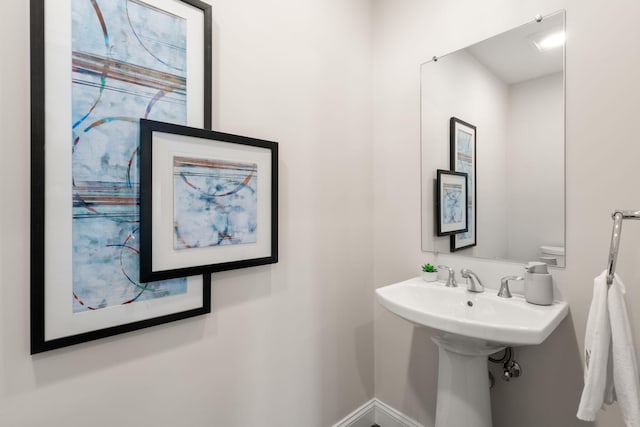 bathroom featuring baseboards