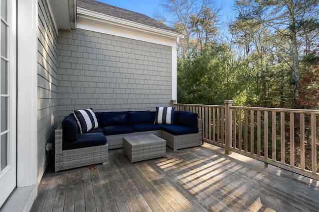 wooden terrace featuring outdoor lounge area