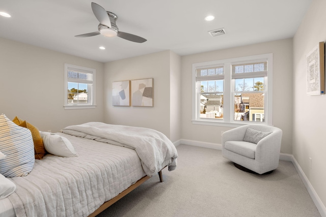 bedroom featuring carpet floors, baseboards, visible vents, and recessed lighting