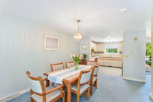 34 Southpoint Dr, Sandwich, MA 02563 - dining area featuring wallpapered walls, plenty of natural light, baseboards, a chandelier, and light carpet