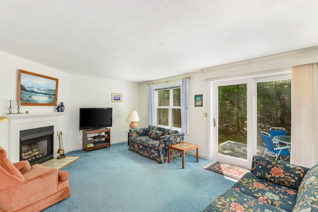 34 Southpoint Dr, Sandwich, MA 02563 - living room with carpet flooring, a fireplace with flush hearth, and baseboards