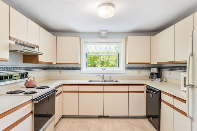 34 Southpoint Dr, Sandwich, MA 02563 - kitchen featuring white appliances, under cabinet range hood, a sink, light countertops, and cream cabinetry