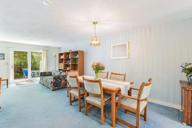 34 Southpoint Dr, Sandwich, MA 02563 - carpeted dining space with a chandelier