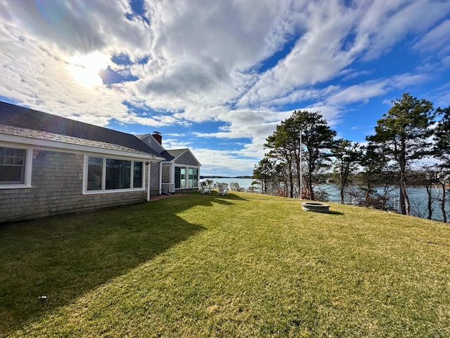 view of yard featuring a water view