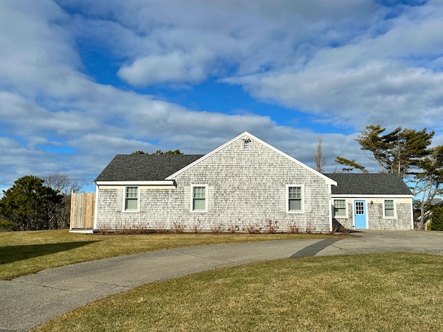 view of front of home with a front lawn