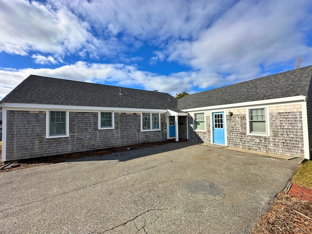 back of property featuring a patio area