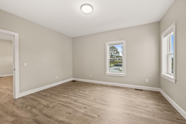 213 S Westgate Rd, Harwich, MA 02645 - unfurnished room featuring light wood-style flooring and baseboards