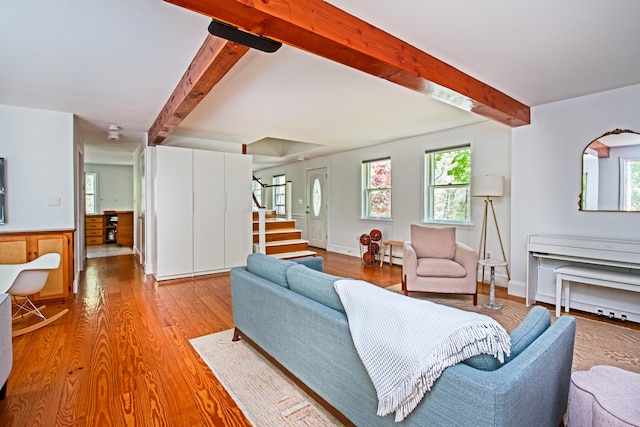 10 Bay View Rd, Wellfleet, MA 02667 - living area featuring beam ceiling, stairway, and wood finished floors