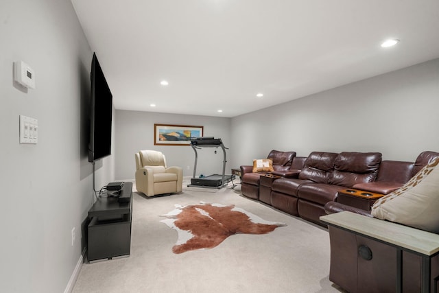 living area with light carpet, recessed lighting, and baseboards