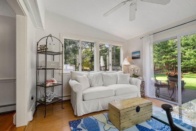 living area featuring ceiling fan, lofted ceiling, wood finished floors, and baseboard heating