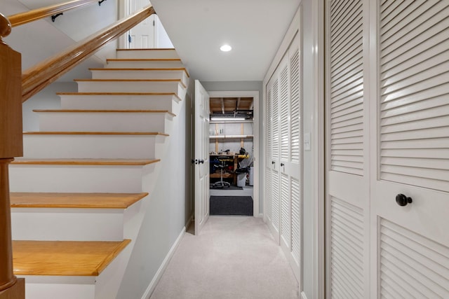 hallway with carpet flooring, recessed lighting, stairs, and baseboards