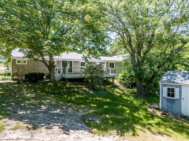 2 Pine Ridge End, Truro, MA 02666 - view of green lawn with a storage shed and a wooden deck