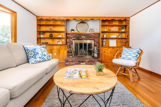 2 Pine Ridge End, Truro, MA 02666 - living room featuring wood finished floors, a fireplace, and built in features