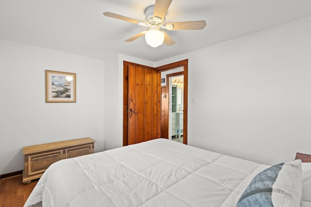 bedroom with wood-type flooring and ceiling fan