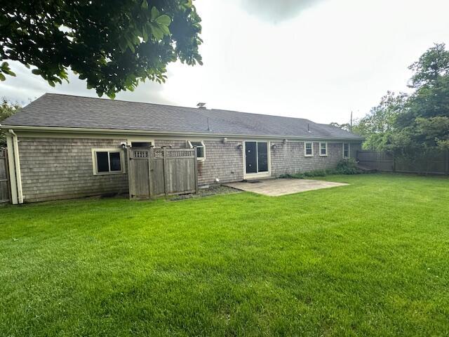 2 Stiles Rd, South Yarmouth, MA 02664 - rear view of house with a patio