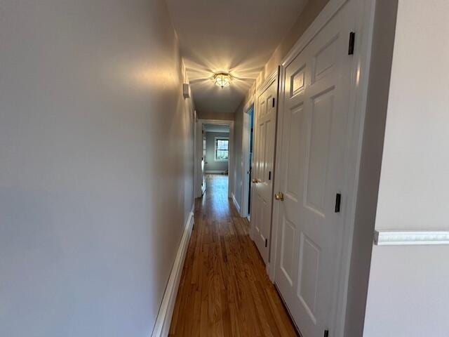 2 Stiles Rd, South Yarmouth, MA 02664 - hallway with wood finished floors and baseboards