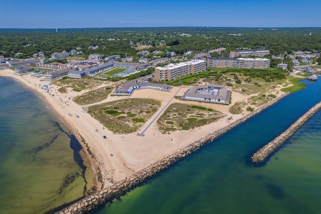 aerial view featuring a water view and a beach view