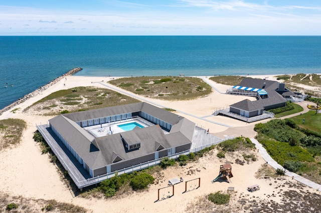 aerial view with a beach view and a water view