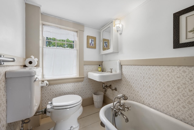 73 Division St, West Harwich, MA 02671 - bathroom with a bath and tile patterned flooring