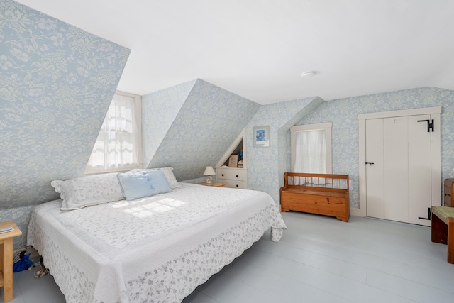 73 Division St, West Harwich, MA 02671 - bedroom featuring wallpapered walls and vaulted ceiling