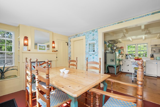 73 Division St, West Harwich, MA 02671 - dining space featuring wallpapered walls and wood finished floors