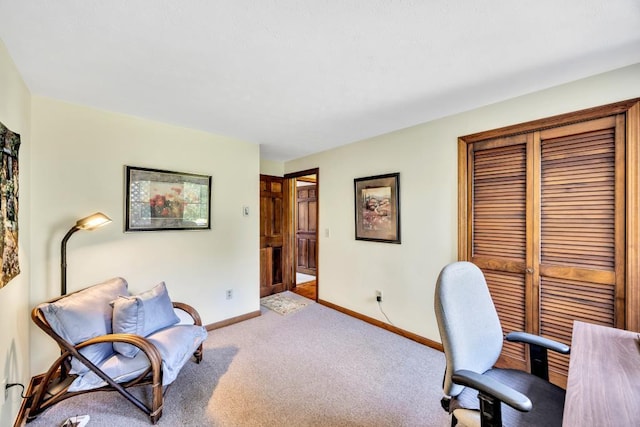 carpeted office with baseboards