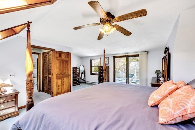 bedroom featuring access to outside, ceiling fan, baseboard heating, carpet, and vaulted ceiling