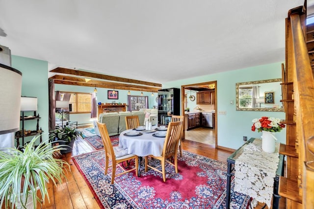dining area with hardwood / wood-style floors