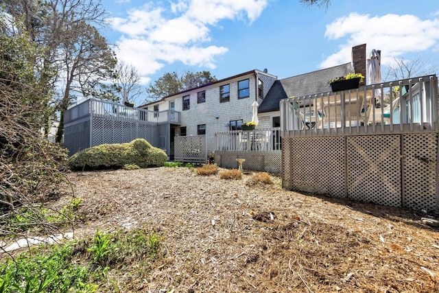 view of yard with a wooden deck