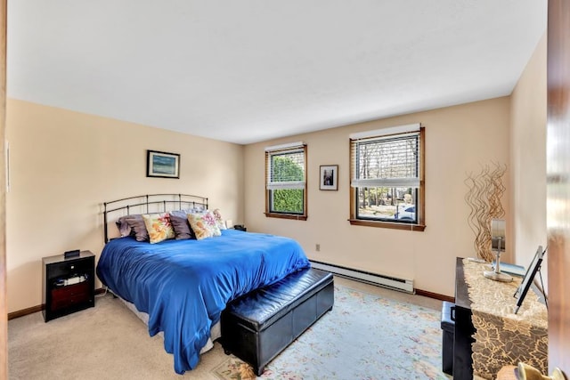 bedroom featuring a baseboard radiator, baseboards, and light carpet
