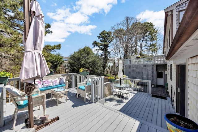 deck featuring an outdoor hangout area