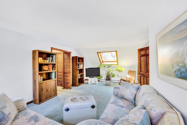 living area with light colored carpet and a skylight