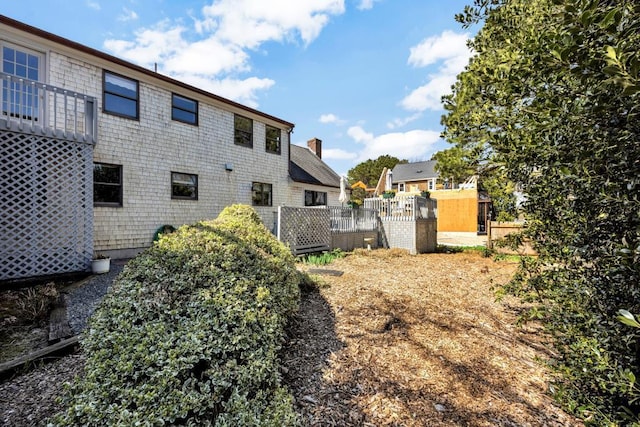rear view of house featuring a residential view