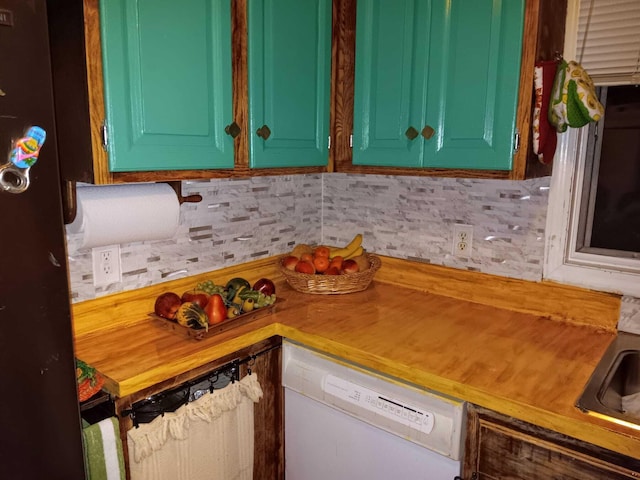 59 Hilltop Ave, Plymouth, MA 02360 - kitchen view of white dishwasher, tasteful backsplash, and freestanding refrigerator