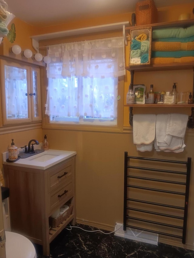 59 Hilltop Ave, Plymouth, MA 02360 - bathroom with healthy amount of natural light, vanity, and toilet