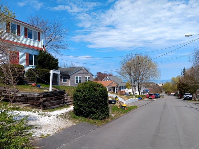 59 Hilltop Ave, Plymouth, MA 02360 - view of asphalt street with a residential view and street lighting