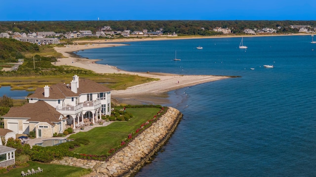 aerial view featuring a water view and a view of the beach