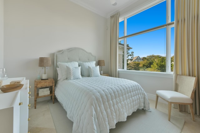 bedroom featuring crown molding