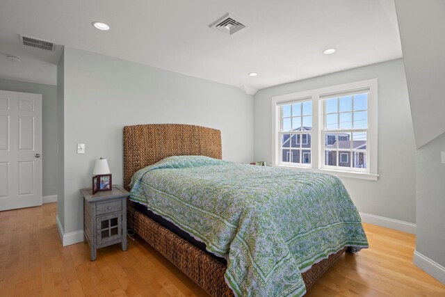 bedroom featuring wood-type flooring