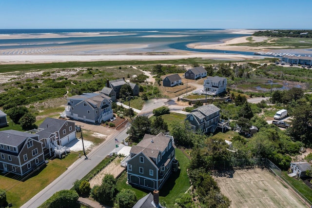 aerial view featuring a water view and a view of the beach