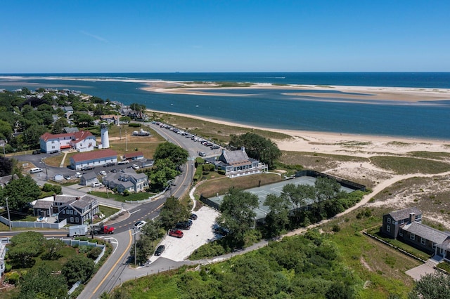 aerial view featuring a water view and a beach view