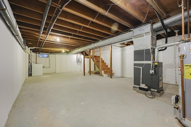 300 Buck Island Rd Unit C13F, West Yarmouth, MA 02673 - unfinished basement with stairway, water heater, and heating unit