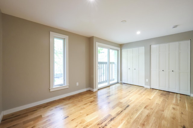 300 Buck Island Rd Unit C13F, West Yarmouth, MA 02673 - unfurnished bedroom with light wood-style flooring, baseboards, two closets, access to outside, and recessed lighting